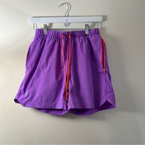 Fabletics Women's Purple Athletic Shorts with Orange Accents